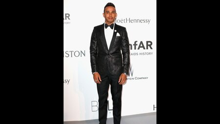 Formula One Ace Lewis Hamilton attended the gala in what is now turning out to be his signature style. He wore a shiny tuxedo with bow-tie. (Getty)
