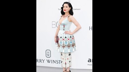 Burlesque queen Dita Von Teese wore a dramatic bell-shaped Ulyana Sergeenko Courture from their SS 15 collection (Getty​)