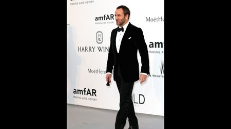 Designer Tom Ford epitomised suave in a Yves Saint Laurent tuxedo. (Getty)