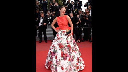 Fashion blogger Natalia Shustova chose a floral pattern gown. Image Credit: Getty Images