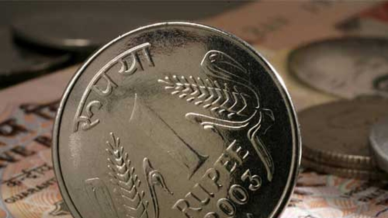 Rupee trims initial gains, still up by 4 paise vs US Dollar