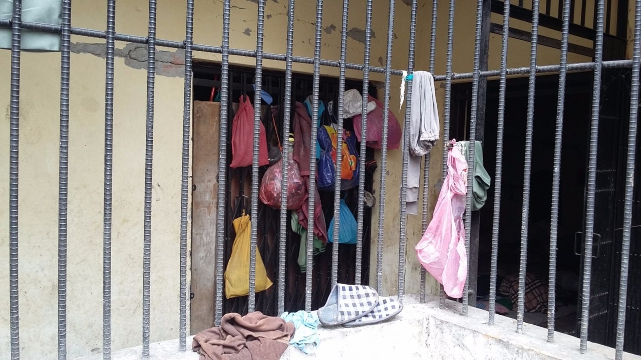 Belongings tied to the jail bars left behind by escaped prisoners