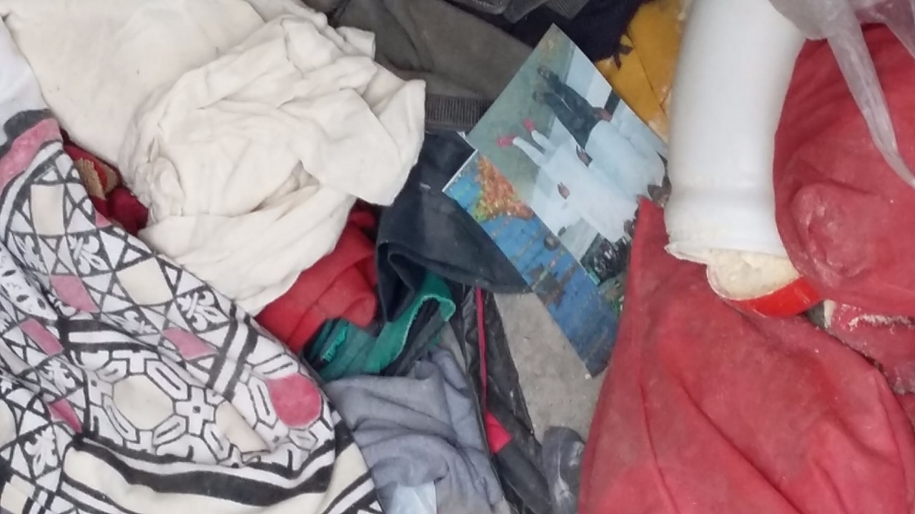 Family photos, clothes and personal belongings of several inmates who once lived behind bars