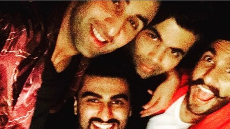 Director Karan Johar takes a selfie with Arjun, Ranbir and Ranveer.