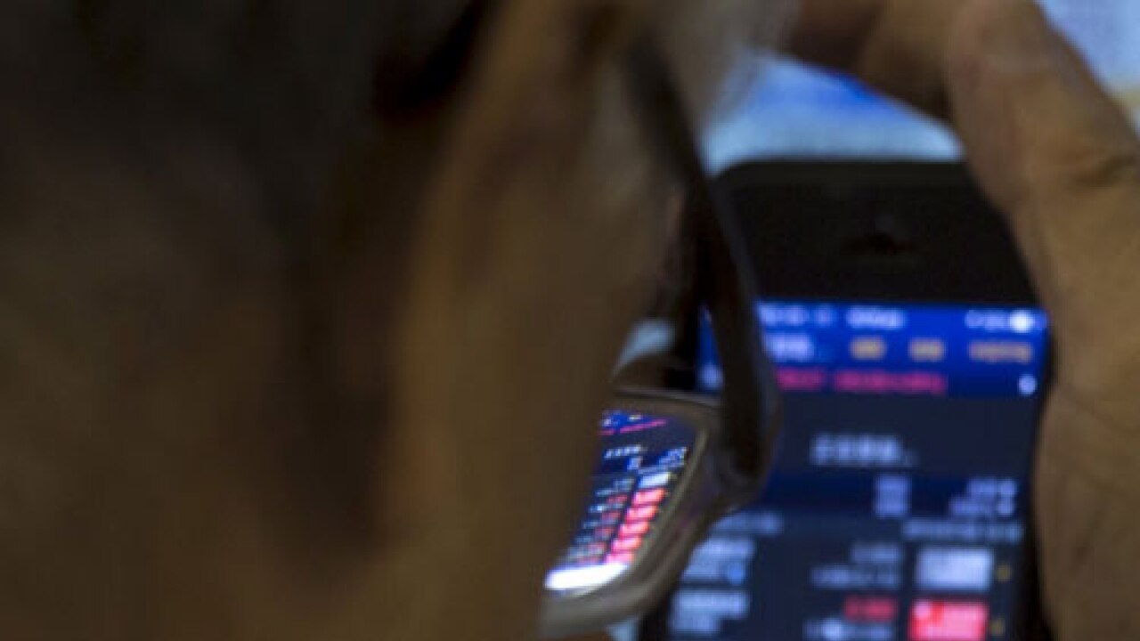 Global markets down on China's rout; glitch hits NYSE trading