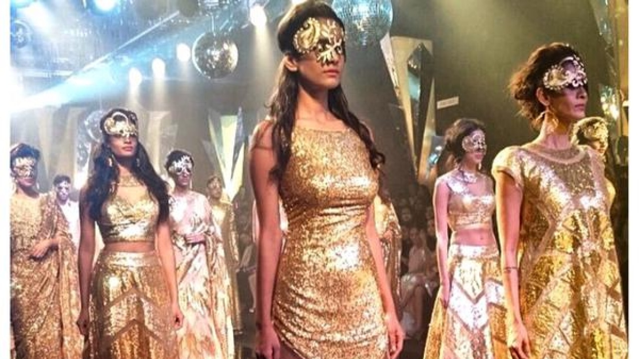 Abu Jani and Sandeep Khosla's golden attires