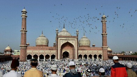 Muslim devotees offer prayers on Eid al-Adha in New Delhi