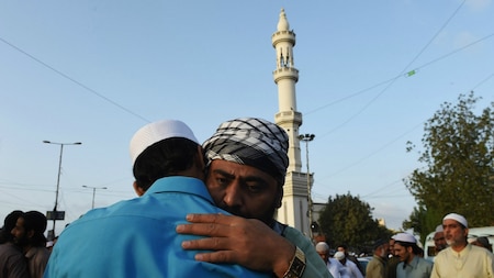 Muslims greeting each other in Karachi