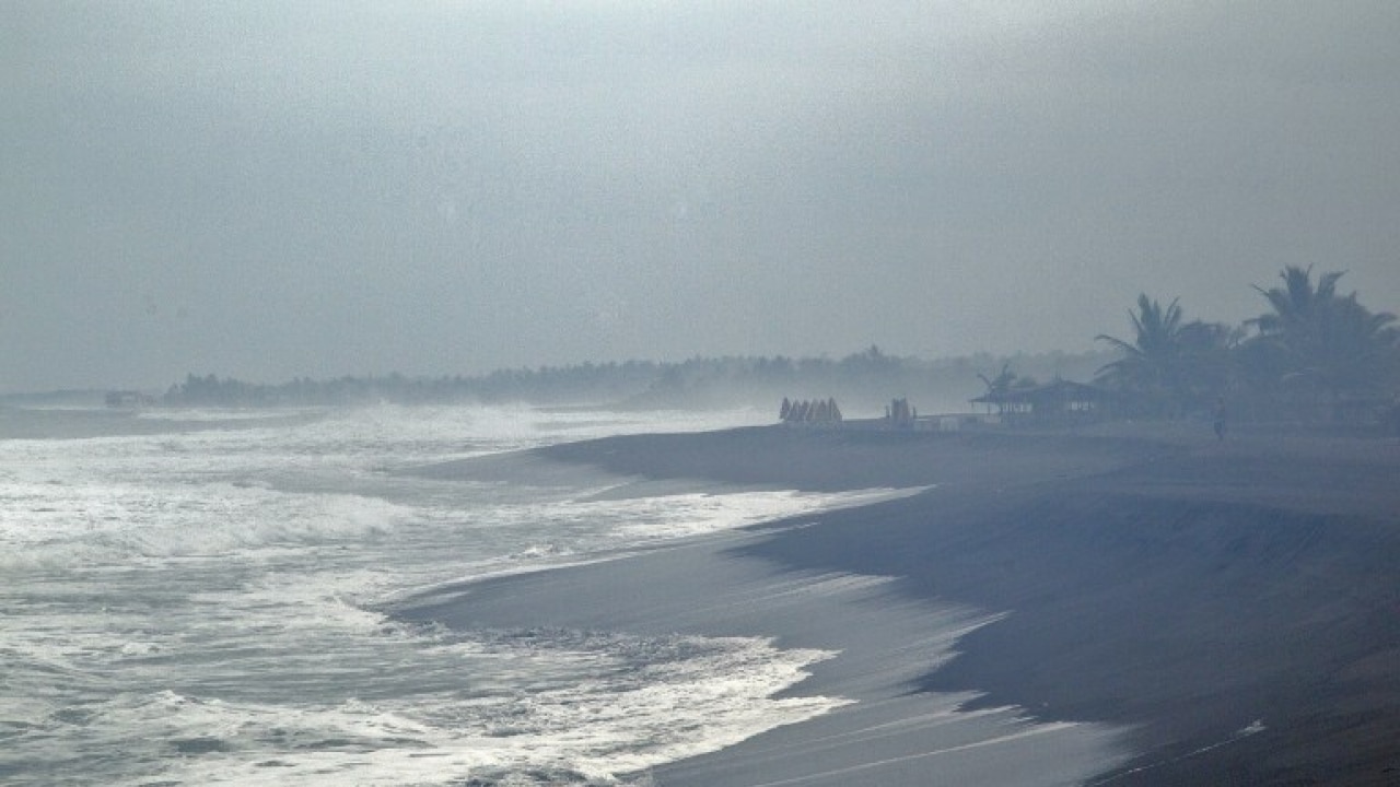 Waves break on the beach in Boca de Pascuales, Colima State, Mexico