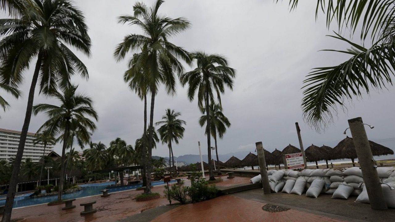 A view of a deserted hotel with sandbag reinforcement