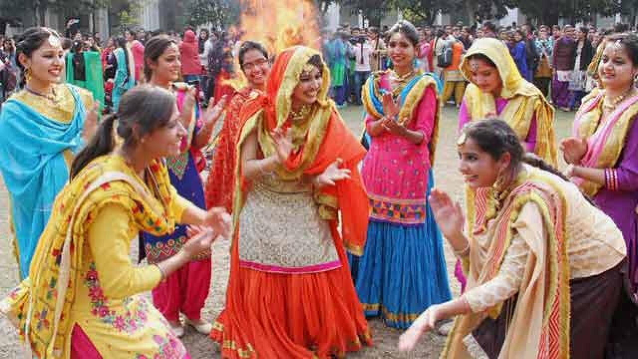 Girls dancing to celebrate Lohri