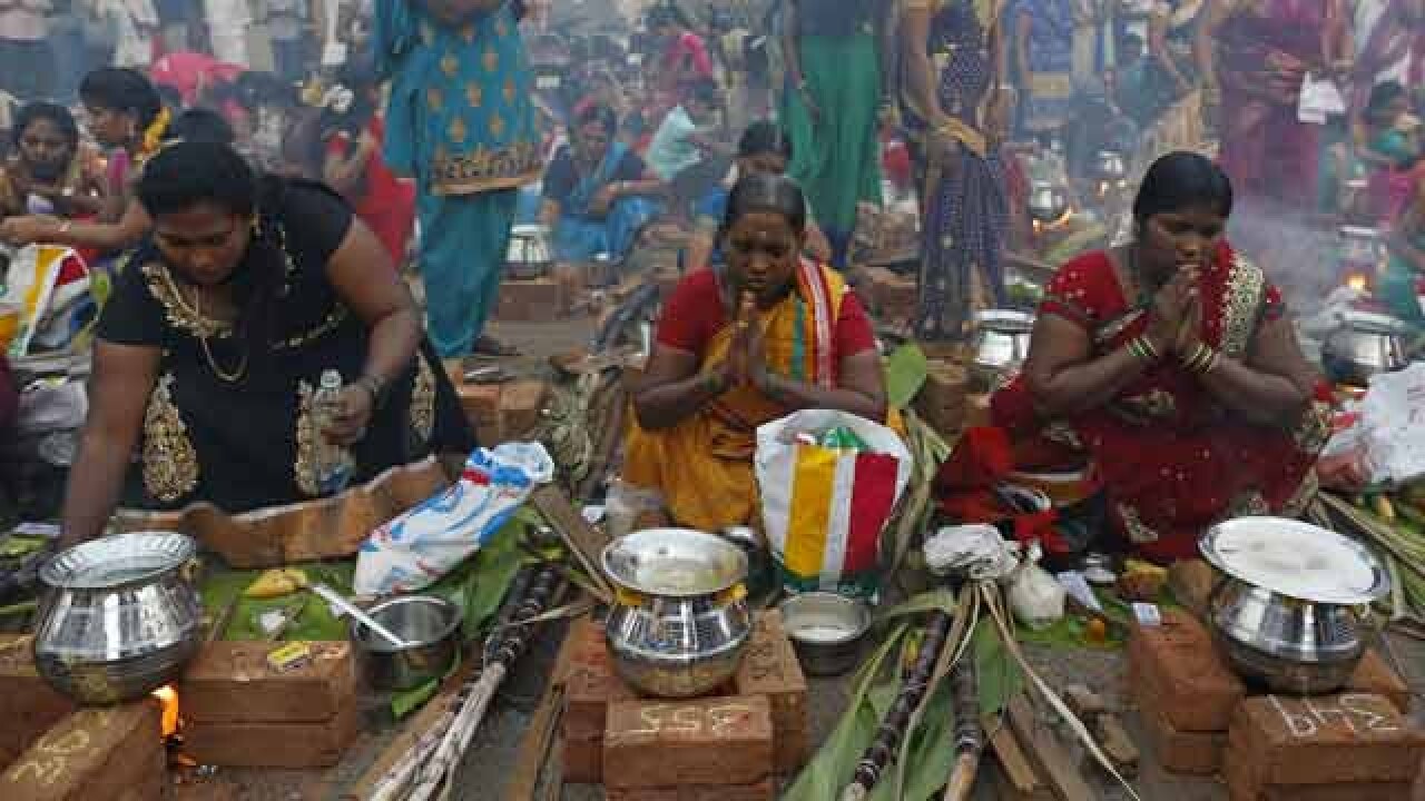 Devotees prepare pongal to offer to Sun God