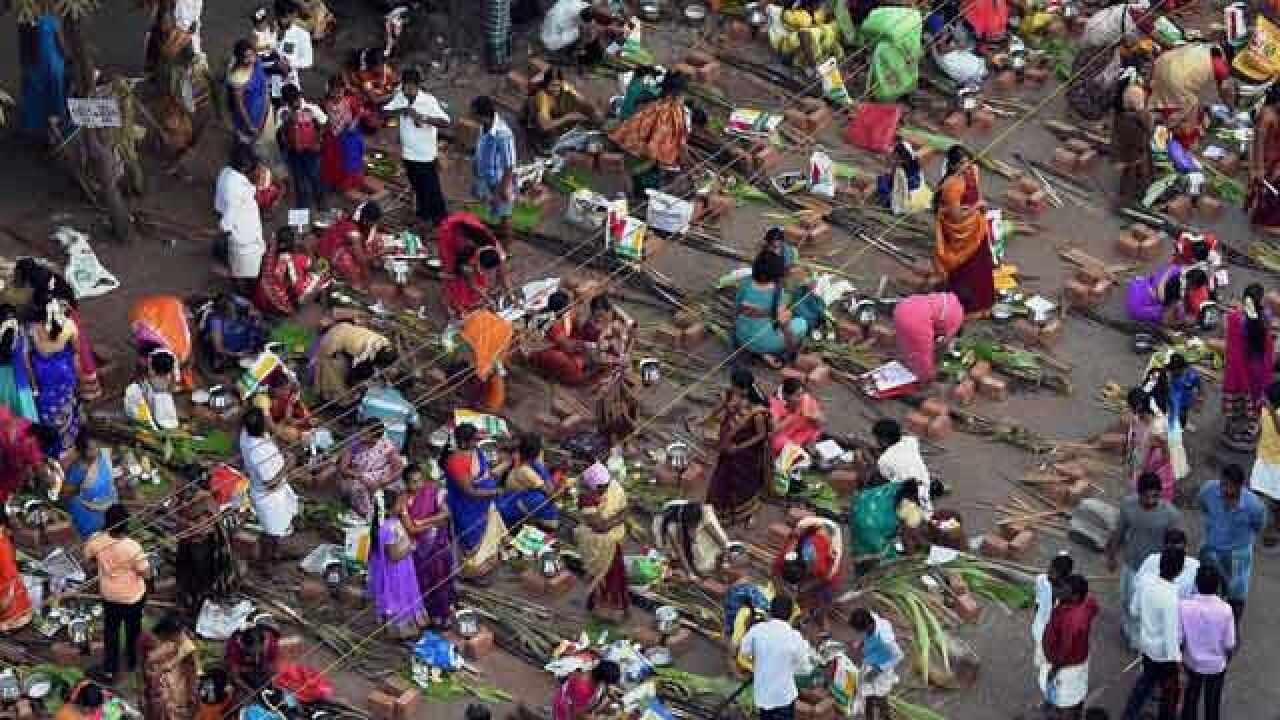 Women preparing pongal