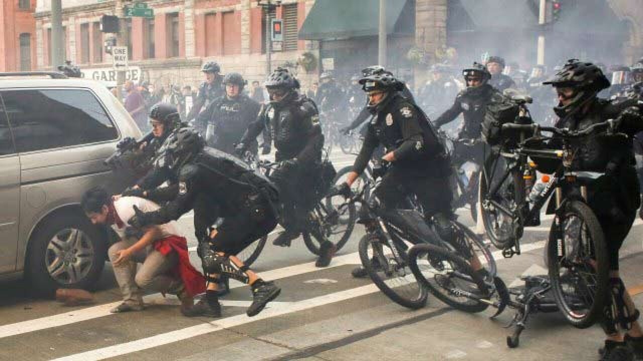 US Seattle police clash with, arrest protesters following May Day marches
