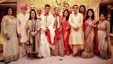 Bipasha Basu and Karan Singh Grover pose with each of their families