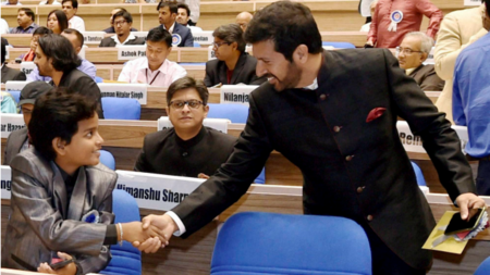 Kabir Khan shakes hand with Gaurav Menon