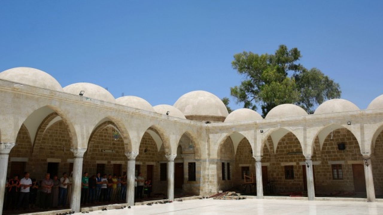 Palestinians pray at Al-Sayed Hashem mosque, Gaza City