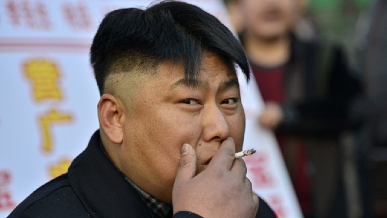 North Korea: Kim Jong Un spotted smoking during an anti-smoking campaign
