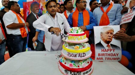 Members of Hindu Sena cutting the cake