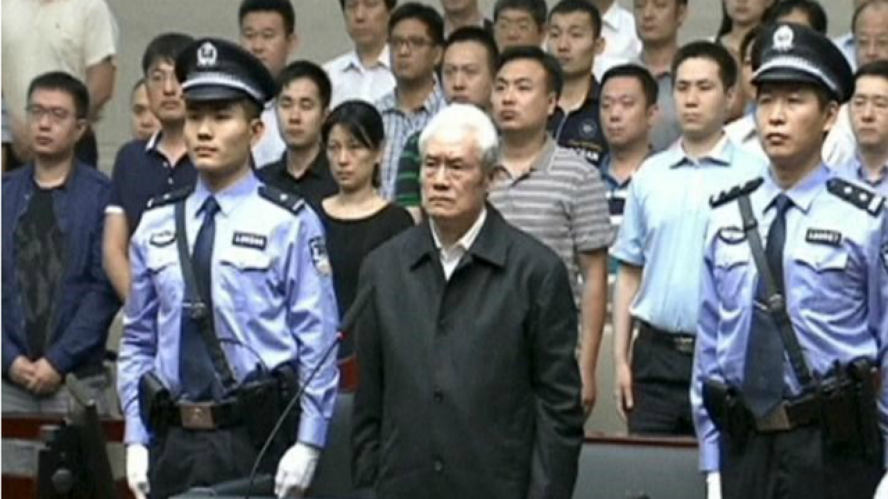 Son, wife of china's former domestic security tsar jailed for graft