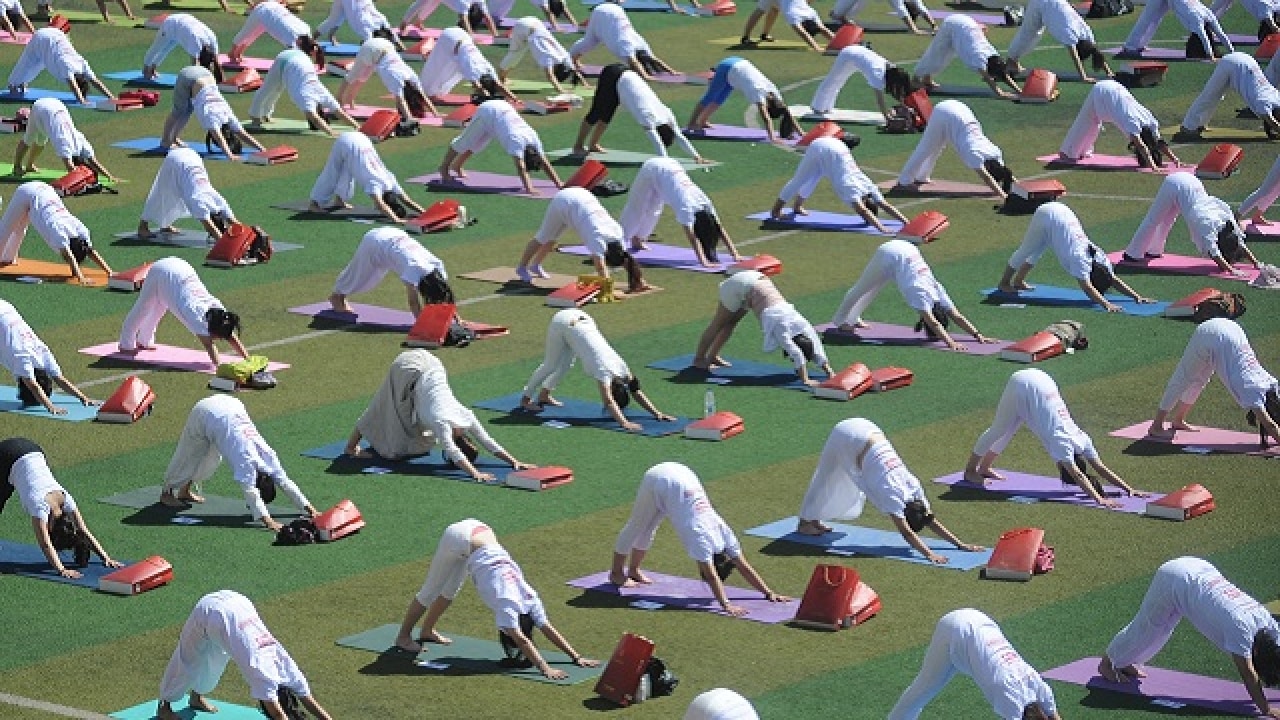 China: Enthusiasts Pratice Indian Spiritual Discipline Ahead Of Yoga Day