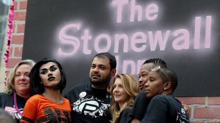 Pulse nightclub owner Barbara Poma (3rd-R) with survivors