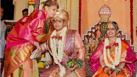Pramoda Devi Wodeyar with the newly-wed couple