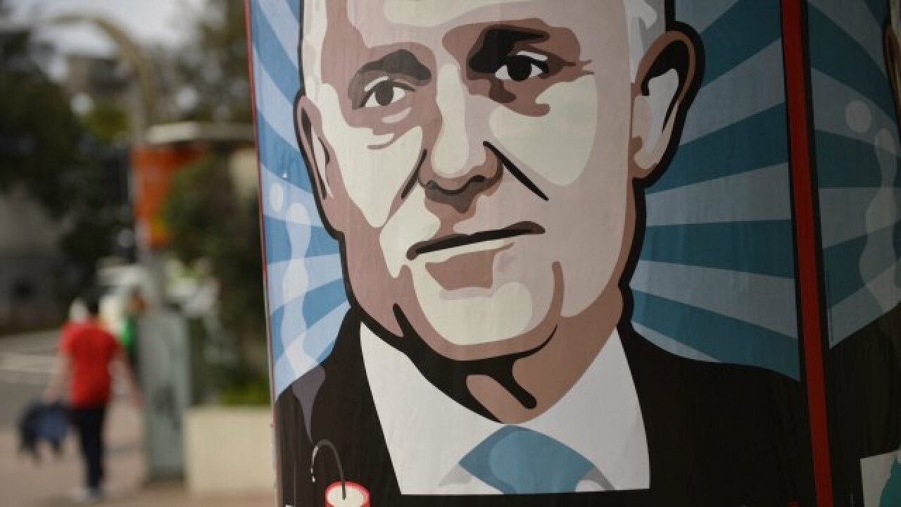 Australia: pm malcolm turnbull scrambles for independent votes as race tightens
