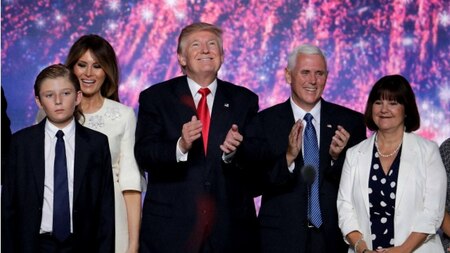 Donald Trump and Mike Pence with (L-R) Barron Trump, Melania Trump and Karen Pence