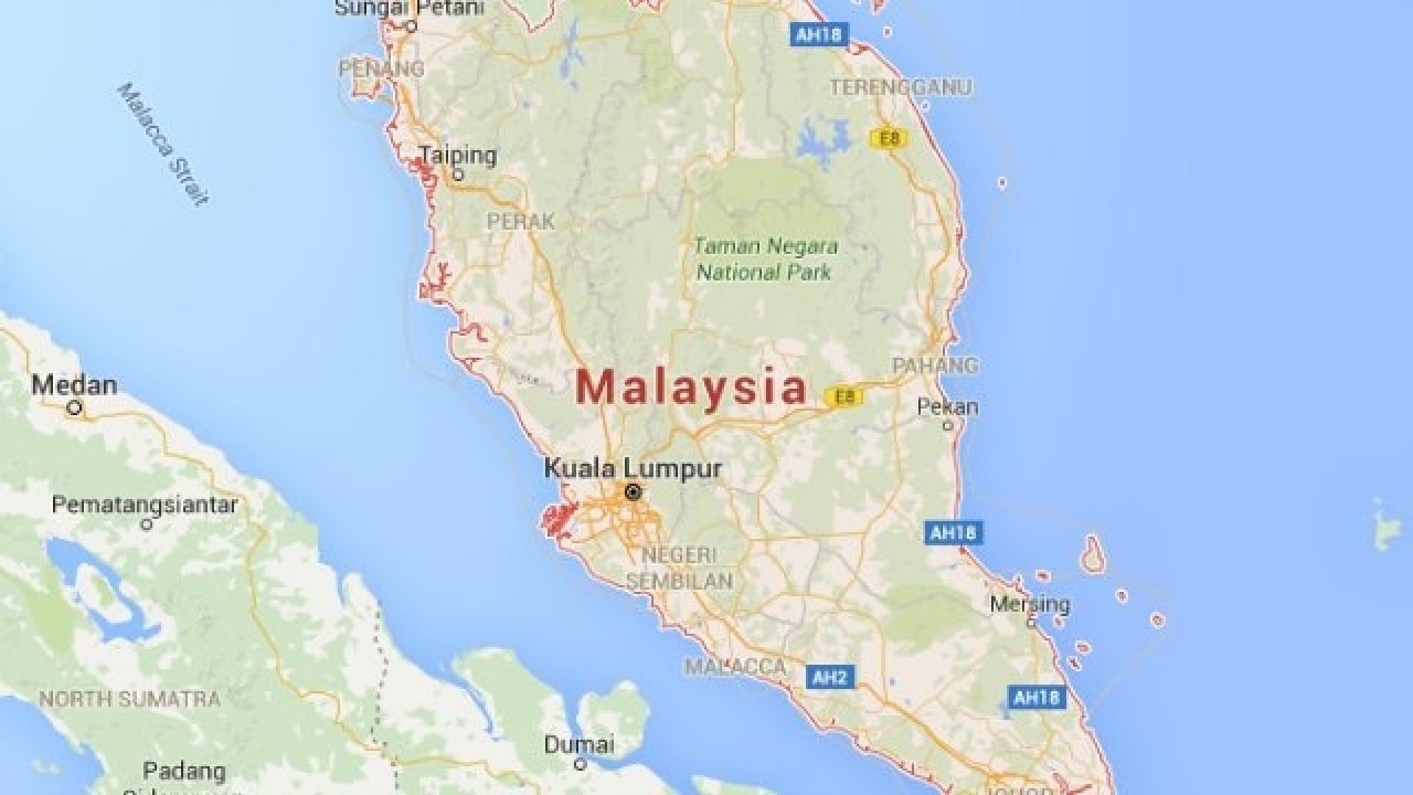 Eight dead, more than 20 missing after boat capsizes off Malaysia