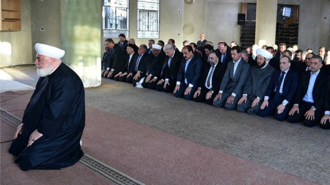 Syria's Bashar al-Assad at Eid prayers in town Daraya 