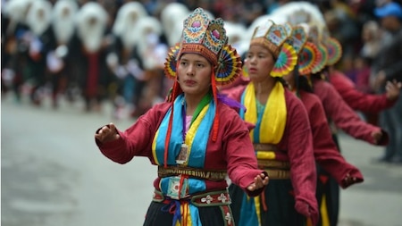 Women perform during Tawang festival