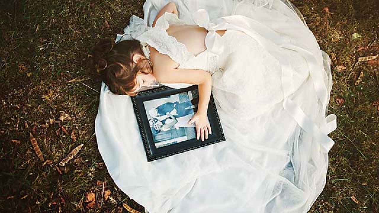 daughter in mom's wedding dress