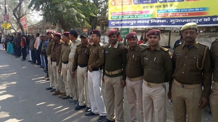 Policeman stand in the human chain