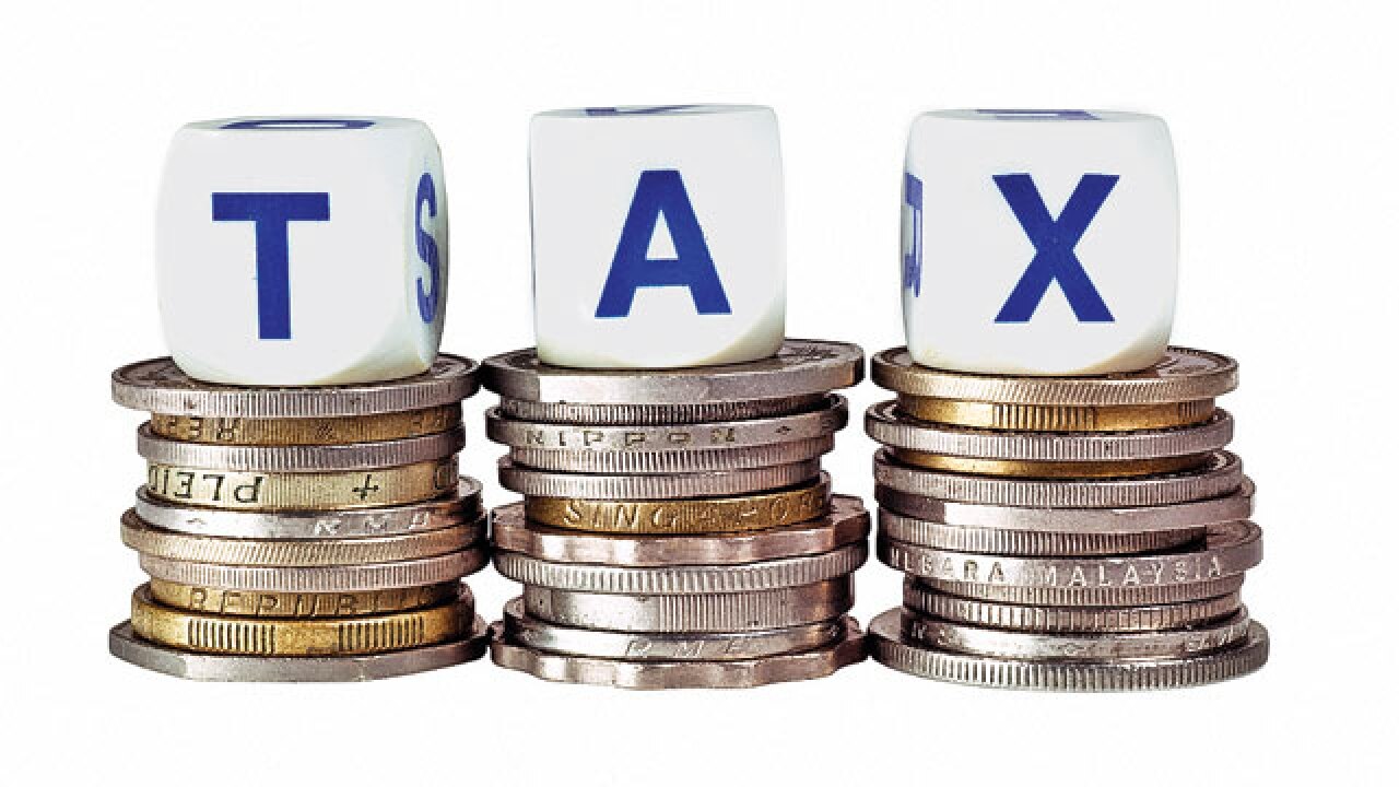 Taxing times: Jaitley plays to the gallery with tax rate cut