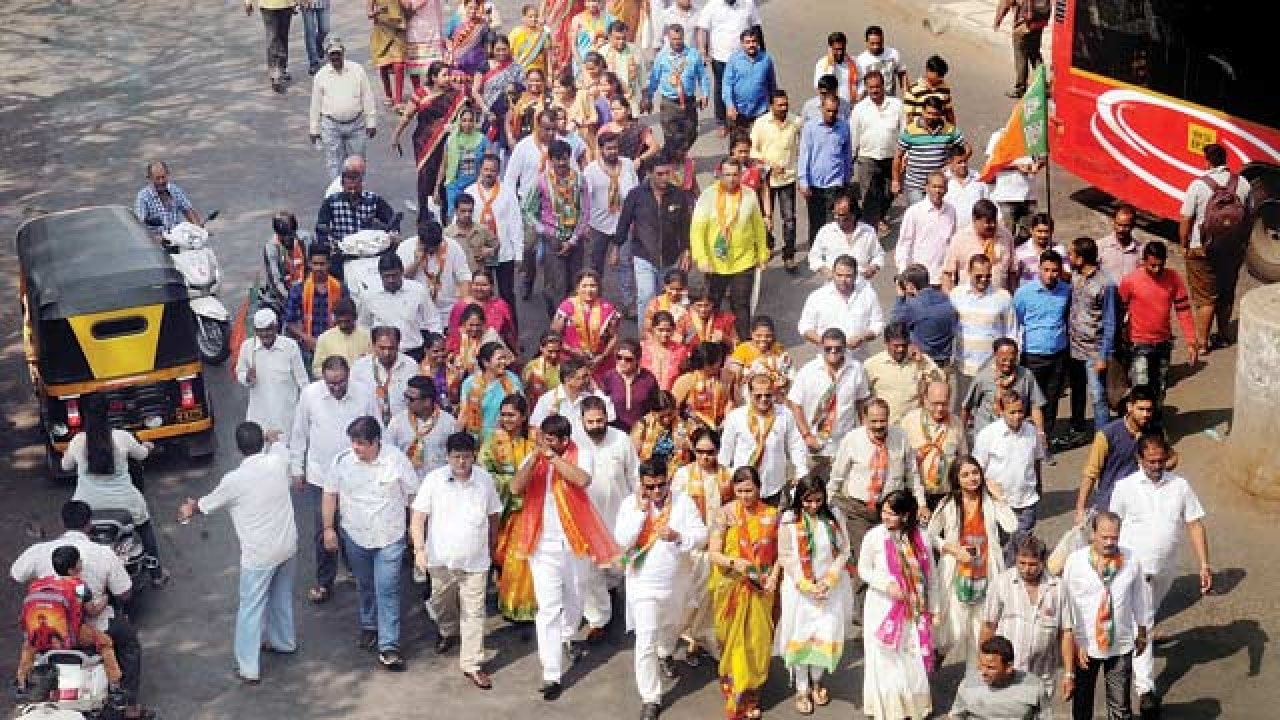 BMC Polls: Candidates woo voters with promise to pay society bills