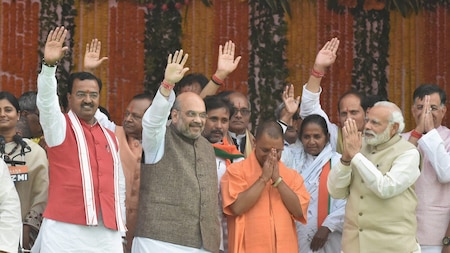 Newly sworn-in UP CM, Yogi Adityanath with PM Modi, Amit Shah and ministers