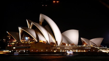 Before: Sydney's Opera House lit up