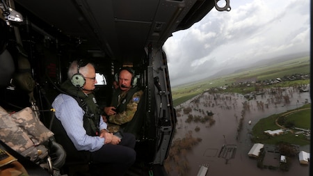 Prime Minister Malcolm Turnbull examines damage