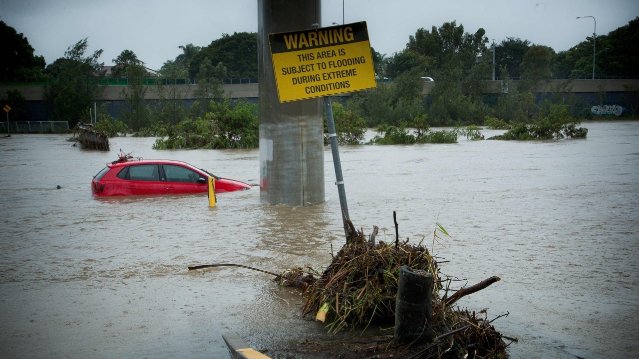 Cars submerged in flooded car park