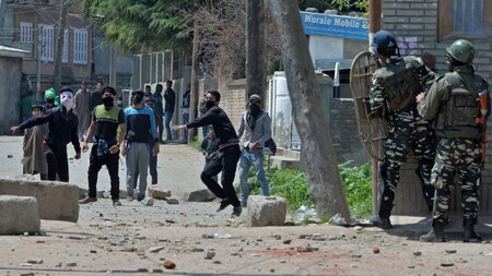 Protesters and police clash