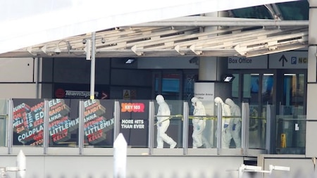 Forensic police scan the venue