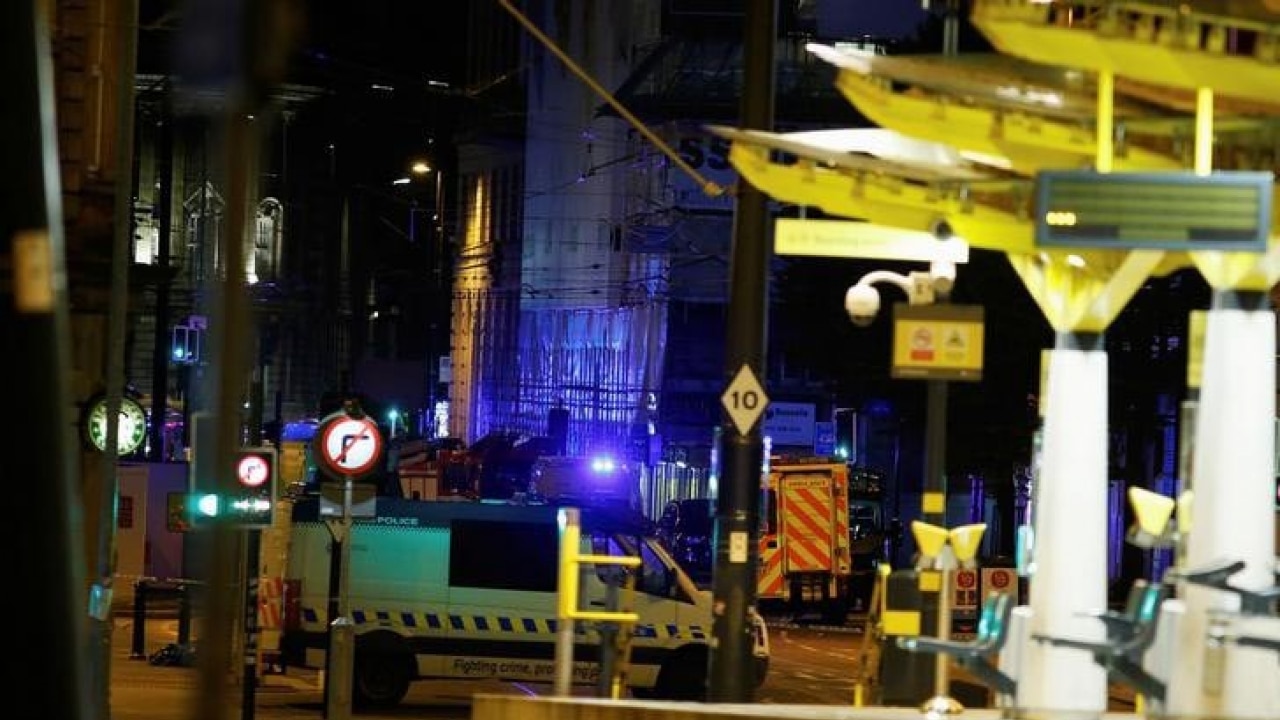 Police cars seen outside the Manchester Arena after the blast