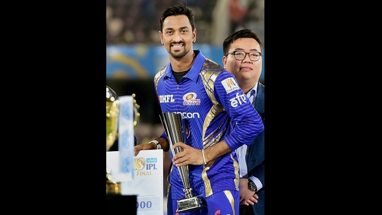 Krunal Pandya gets the Man of the Match trophy after the IPL 10 final
