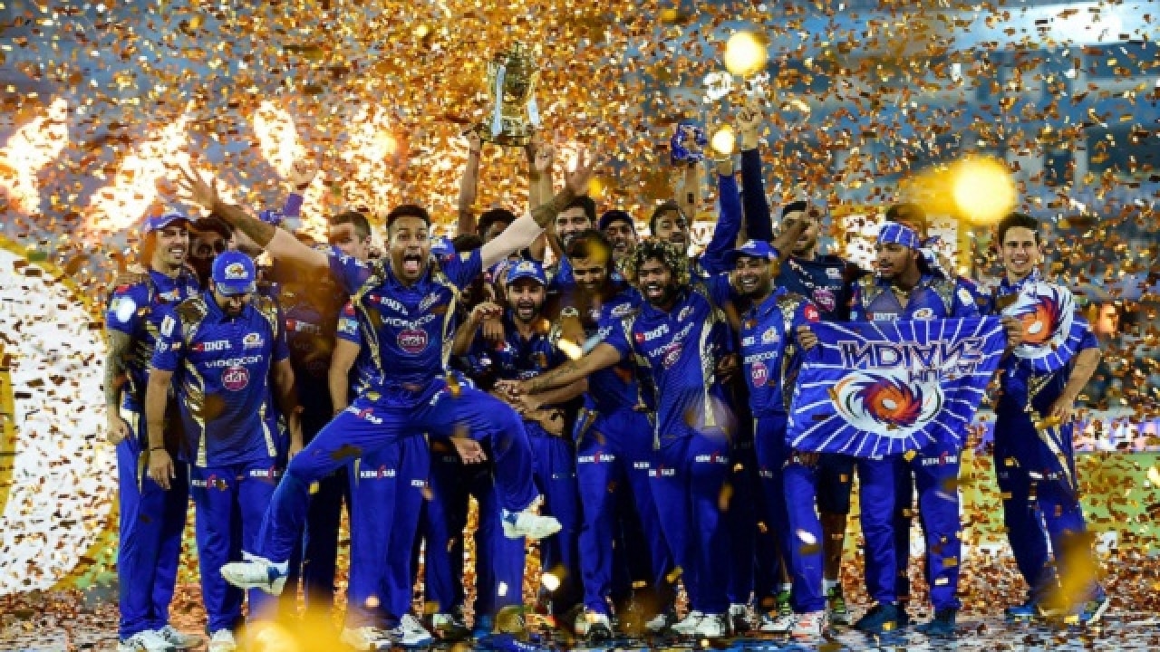Mumbai Indians players with the IPL trophy