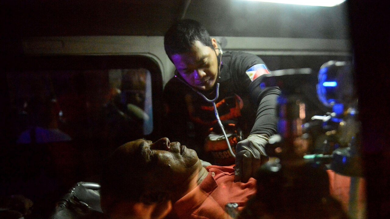 Rescue worker helps victim