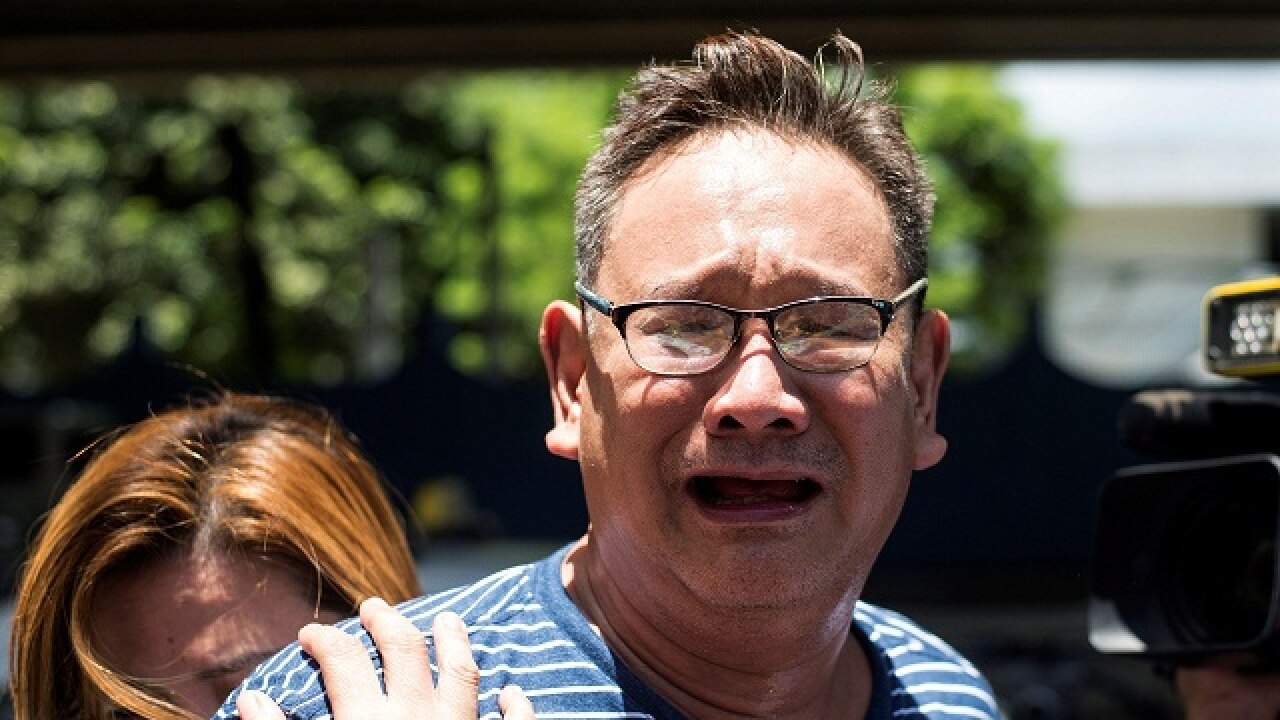 Relatives mourn
