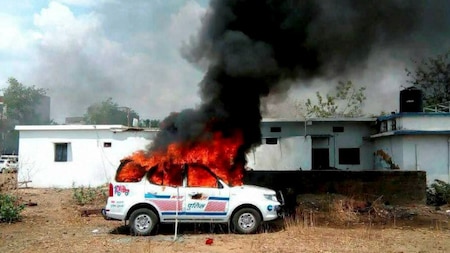 Police vehicles burnt