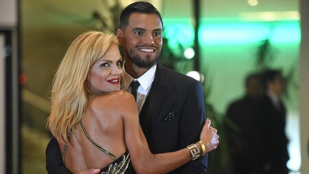 Sergio Romero poses with his wife