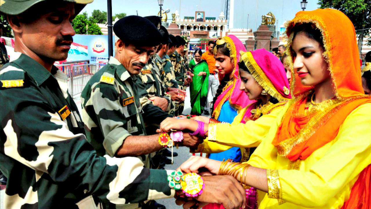 Students celebrating Rakhi with BSF personnel